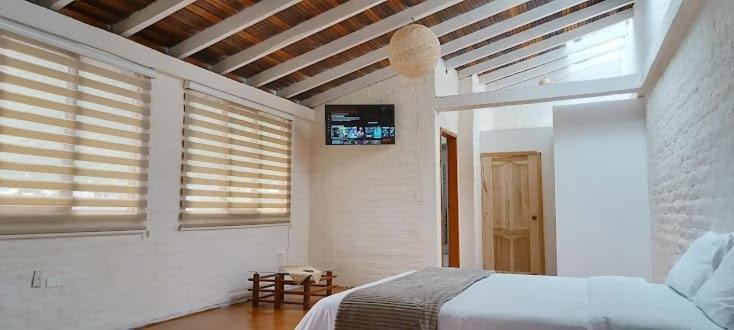 Bed and Breakfast Rustic Quinta La Aurora Баньйос Номер фото